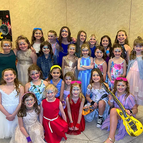 5 kids at a kid's party.