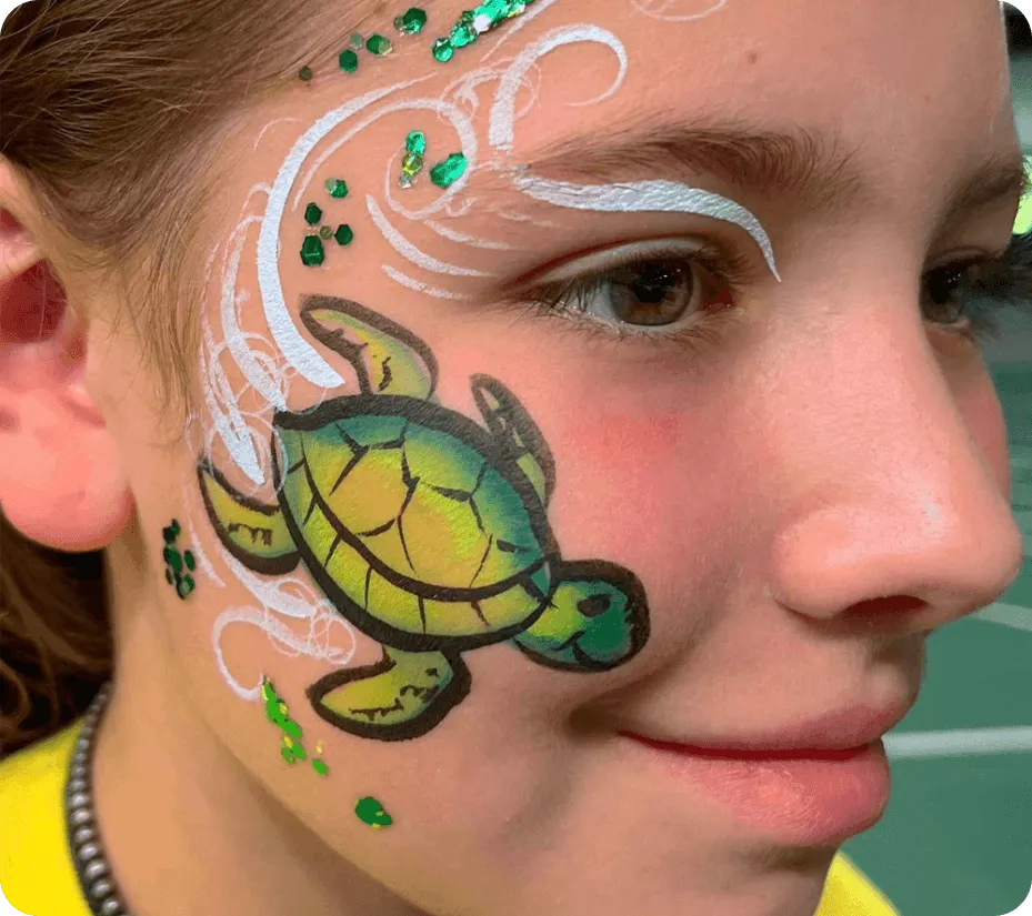 A kid proudly displaying an amazing facepaint artwork